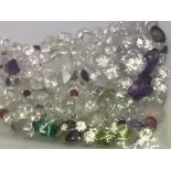 A bag of loose mixed stones including cubic zircon