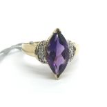 A 14ct yellow gold ring set with amethyst and diam