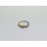 An 18ct gold ring set with 4 diamonds approx 0.30c