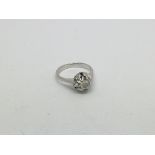 An 18ct white gold ring set with a rose cut diamon