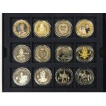 A box containing twelve Commemorative coins