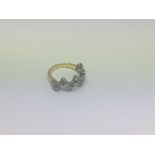 An 18ct gold ring set with 17 diamonds approx 1ct