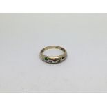 A 9ct gold ring set with multi stones. Size q/r ap