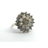 A 9ct yellow gold cluster ring set with diamonds a