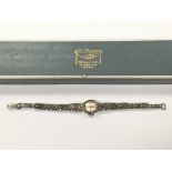 A vintage silver and marcasite ladies watch in box