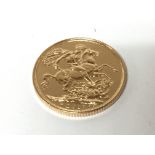 A gold 2017 Sovereign.