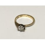 An 18carat gold and platinum ring set with a solit