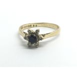 An 18ct yellow gold sapphire and diamond cluster r