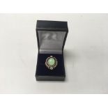 A ladies 14k gold opal and diamond ring, approx we