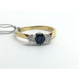An 18ct yellow gold sapphire and diamond ring, wei