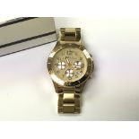 A gold tone Marc by Marc Jacobs wrist watch