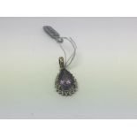 A 9ct gold tear pendant set with amethyst and diam