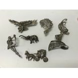 7 silver and marcasite set brooches.