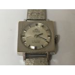A ladies Tiara 17 jewel watch with a square case t