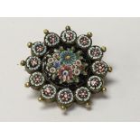 A Micro Mosaic floral design brooch. 2.6cm diamete