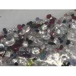 A bag of loose mixed stones including cubic zircon