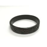 A carved Chinese bangle - NO RESERVE