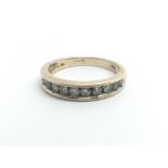 A 9ct yellow gold and diamond half eternity ring,