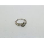 An 18ct white gold ring set with 5 diamonds approx