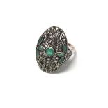 An Art Deco marcasite and green stone ring having