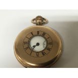 A gold plated half hunter button wind pocket watch