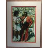 George Best + Pele Signed Photo: 1977 mounted colour photo of George Best of LA Aztecs. He is