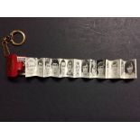 1969/70 Coffer Manchester United Keyring: Manchester United roll out pictures of players.