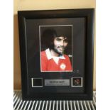 Framed Special Edition Sports Cell Of George Best. Nicely framed in black mount and frame.