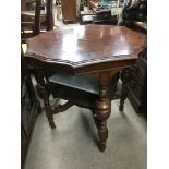 A mahogany side table with shaped top and later al