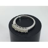 An 18ct white gold 5 stone diamond ring, approx 0.