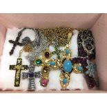 A collection of crosses on chains.