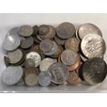 A box containing mixed coins including a 1738 Thal