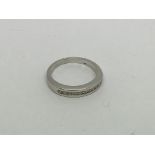 A 9ct white gold half eternity ring set with 11 di