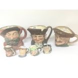 Three large Royal Doulton character jugs and four