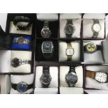 Thirteen boxed gents watches, various makes includ