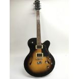 A Yamaha AE500 electric guitar with hard carry cas