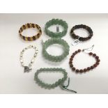 Seven bracelets set with various stones including
