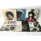 A collection of 7 inch singles by various artists from the 1960s onwards including Bob Dylan, Pink