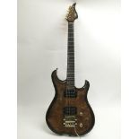 A Lag electric guitar with woodgrain finish and fitted with two humbuckers. Comes supplied with a