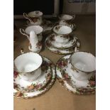 A Royal Albert country rose six place tea set .