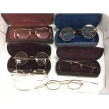 Six pairs of vintage spectacles.