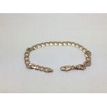 A 9ct gold bracelet with slab sided open links, ap