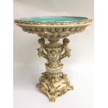 A majolica centrepiece decorated with cherubs and