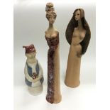 Three studio pottery figures, tallest approx 41cm.