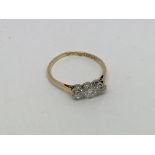 An 18ct gold ring set with 3 diamonds approx 0.5ct