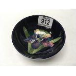 A small Moorcroft bowl with iris pattern. 11cm.