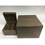 A boxed Gucci diamond dial ladies watch.