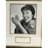A framed and glazed signed Joyce Grenfell photo di