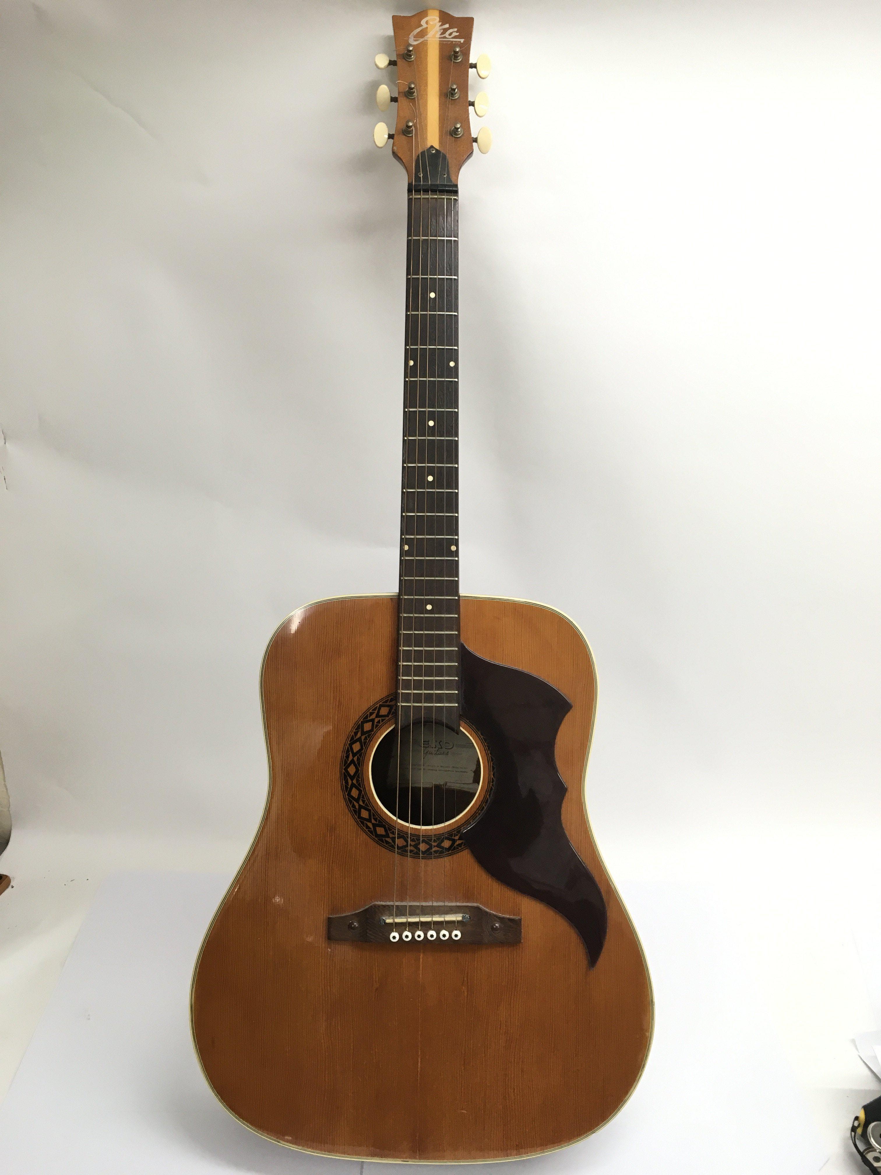 An Eko Ranger acoustic guitar.