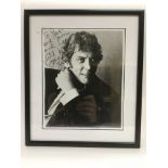 A framed and glazed signed and dedicated photo of Donald Sutherland, approx 29cm x 33.5cm.